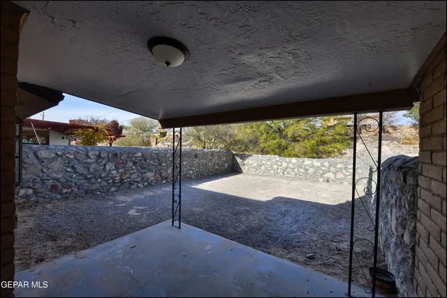 an aerial view of a house with a garden