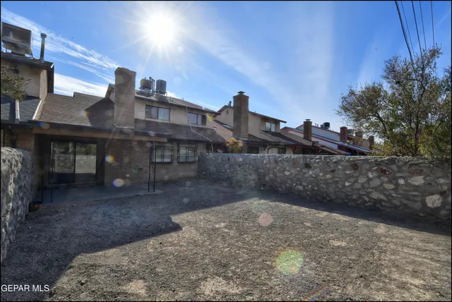 an aerial view of residential house with outdoor space