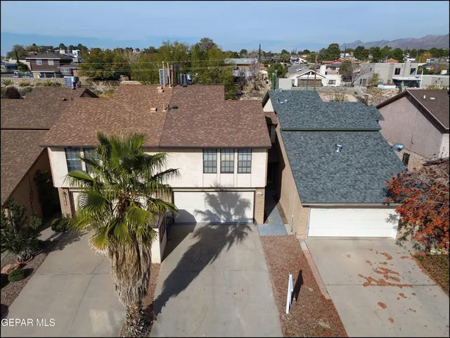 a view of a city with mountains