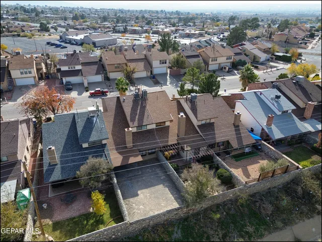 an aerial view of a city with lots of residential buildings