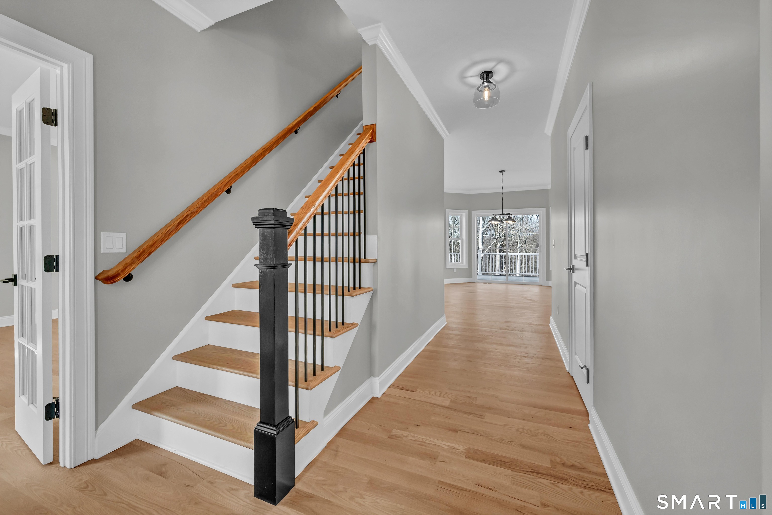 1427 Monroe Turnpike Monroe, CT 06468 - Photo 16 of 41 a view of a hallway with staircase