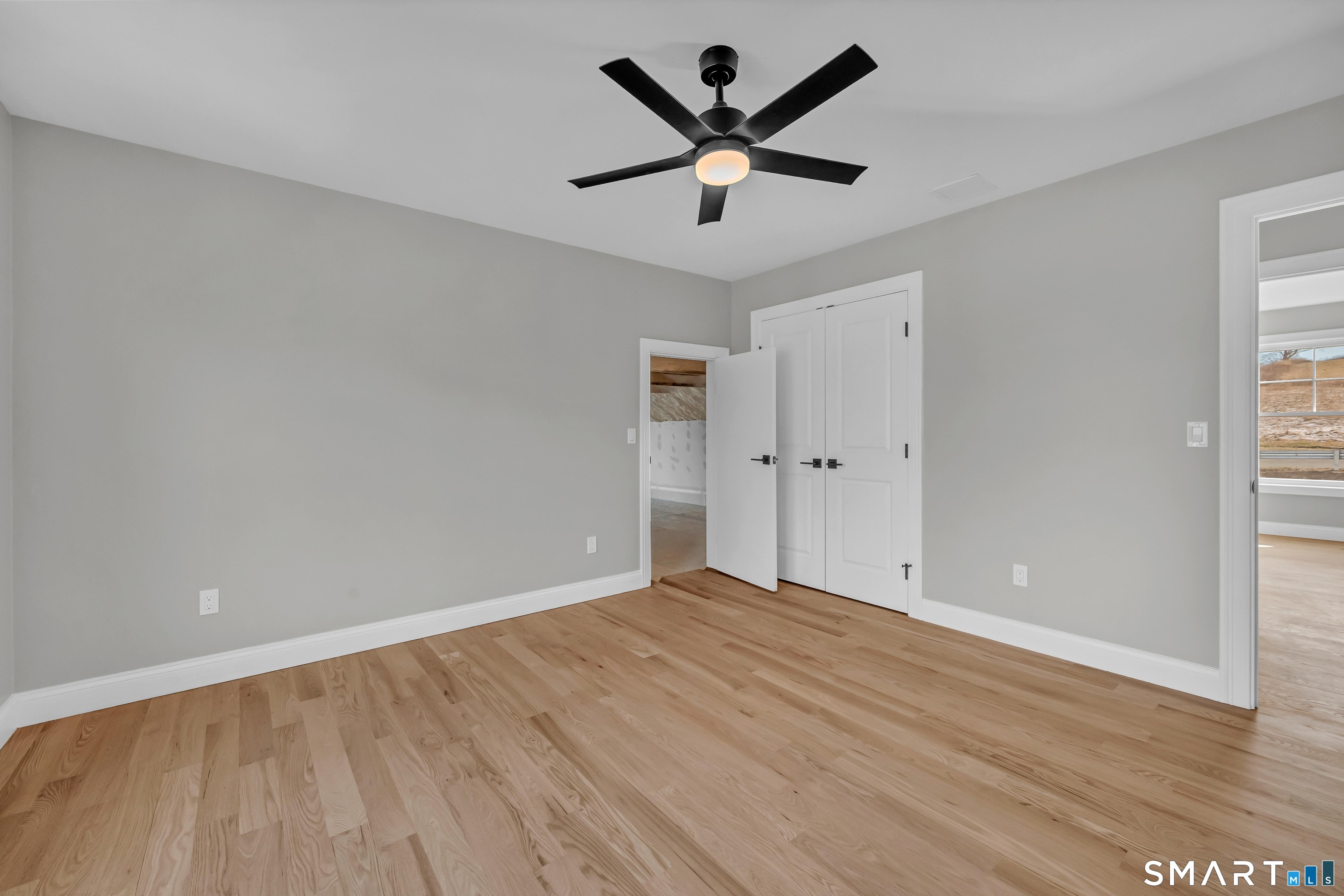 1427 Monroe Turnpike Monroe, CT 06468 - Photo 22 of 41 wooden floor in an empty room