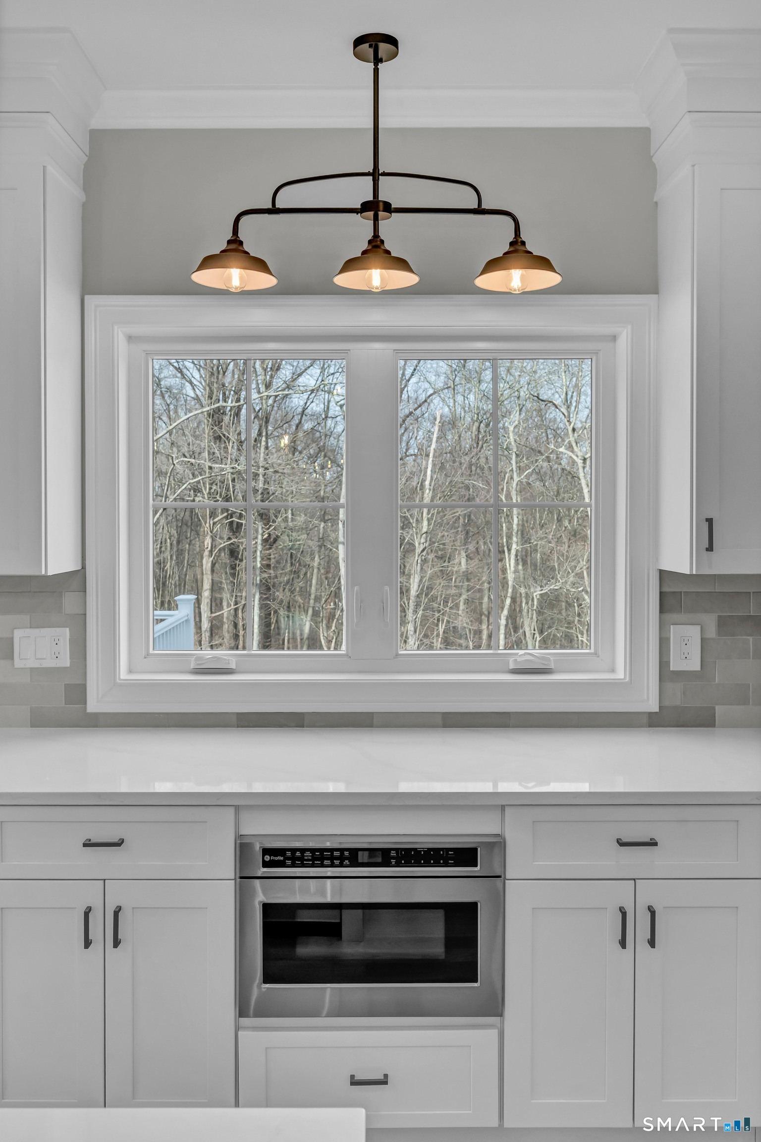 1427 Monroe Turnpike Monroe, CT 06468 - Photo 4 of 41 a kitchen with a sink and cabinets