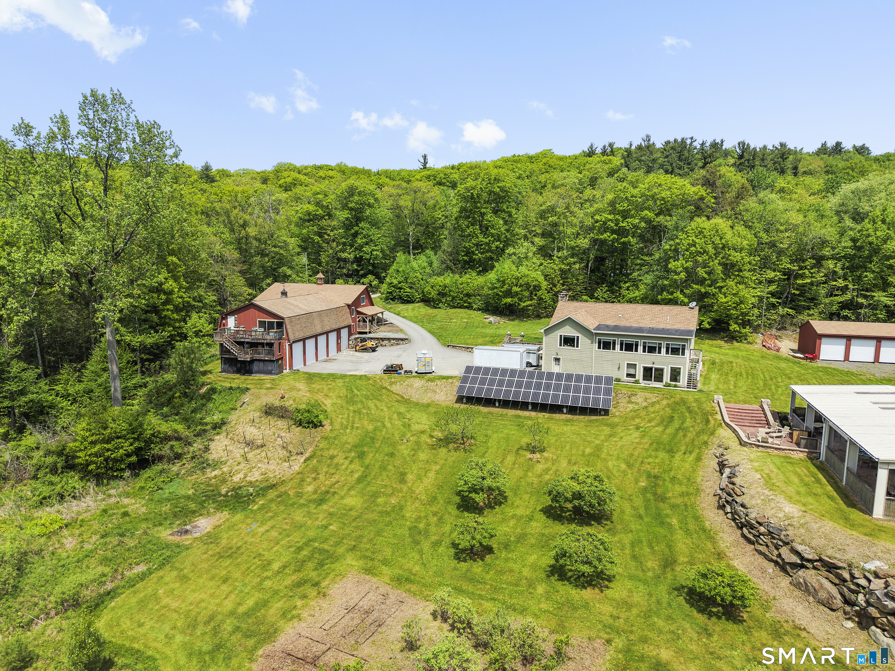 80 Holmes Road Goshen, CT 06756 - Photo 8 of 40 a view of a house with a big yard