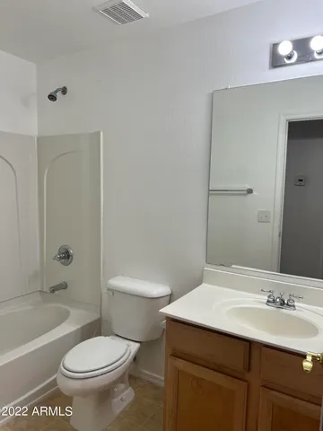 a bathroom with a sink a toilet and a bathtub