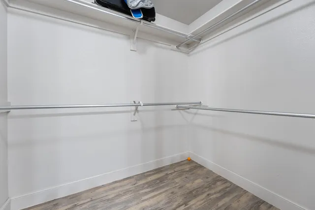 a view of a room with racks on the wall