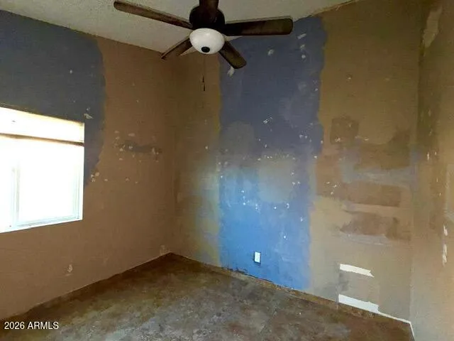 en empty room with windows