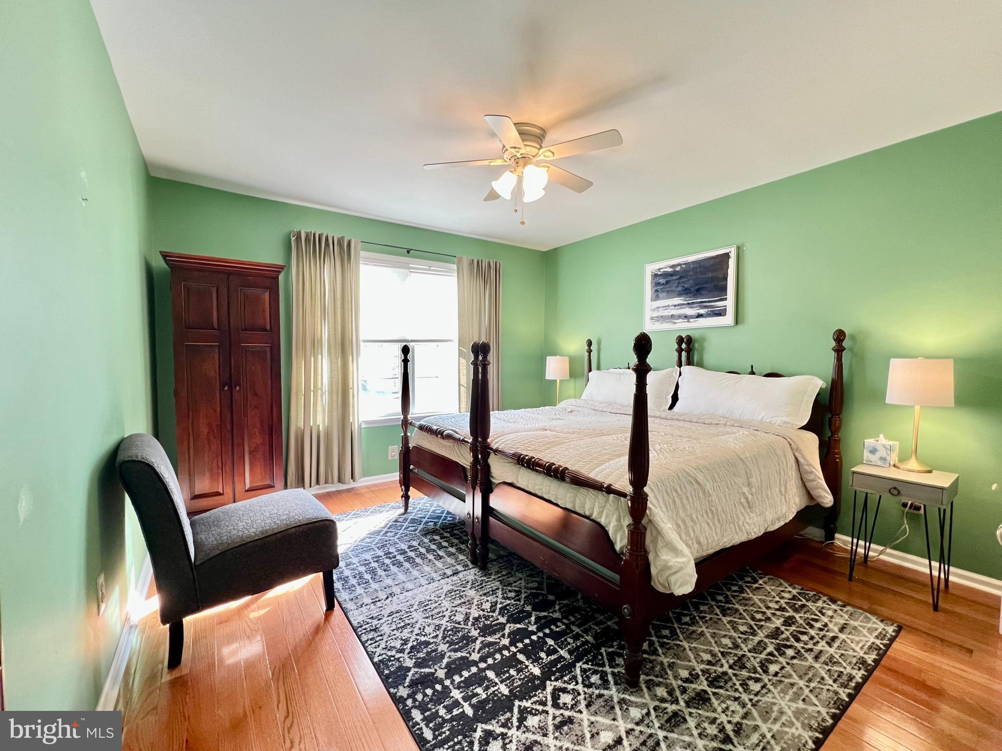 668 Greycliffe Lane Lower Gwynedd, PA 19002 - Photo 22 of 33 a bedroom with a bed and wooden floor