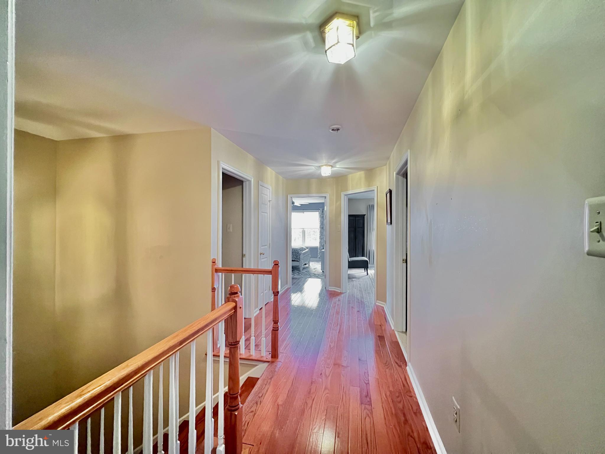668 Greycliffe Lane Lower Gwynedd, PA 19002 - Photo 24 of 33 a view of a hallway with wooden floor