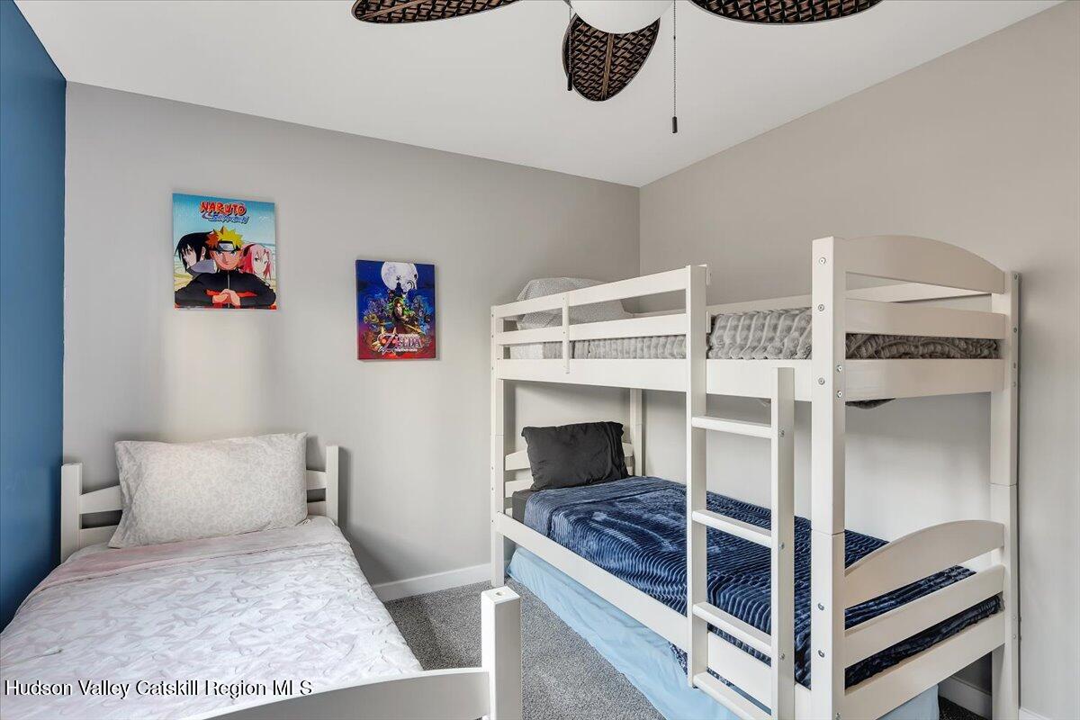 114 Ford Hill Road Hunter, NY 12442 - Photo 17 of 40 a bedroom with a bed and a window