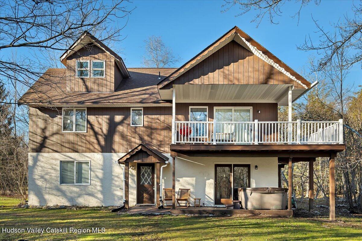 114 Ford Hill Road Hunter, NY 12442 - Photo 2 of 40 a front view of a house with a yard