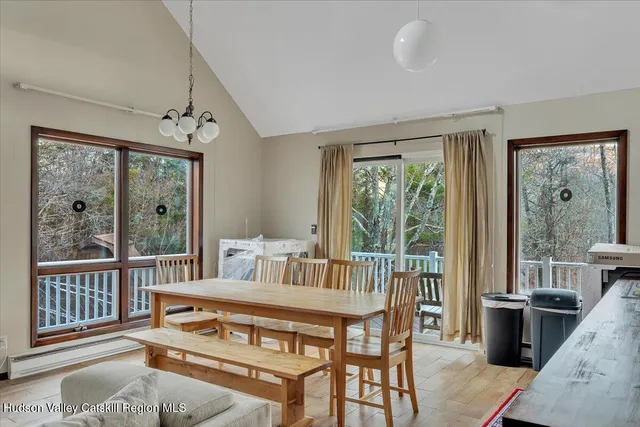 a view of a two chairs on the deck