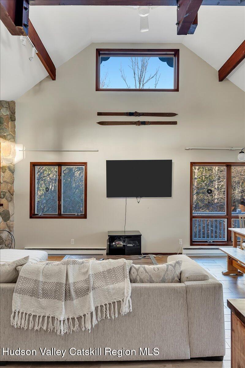 114 Ford Hill Road Hunter, NY 12442 - Photo 23 of 40 a living room with furniture and a night stand