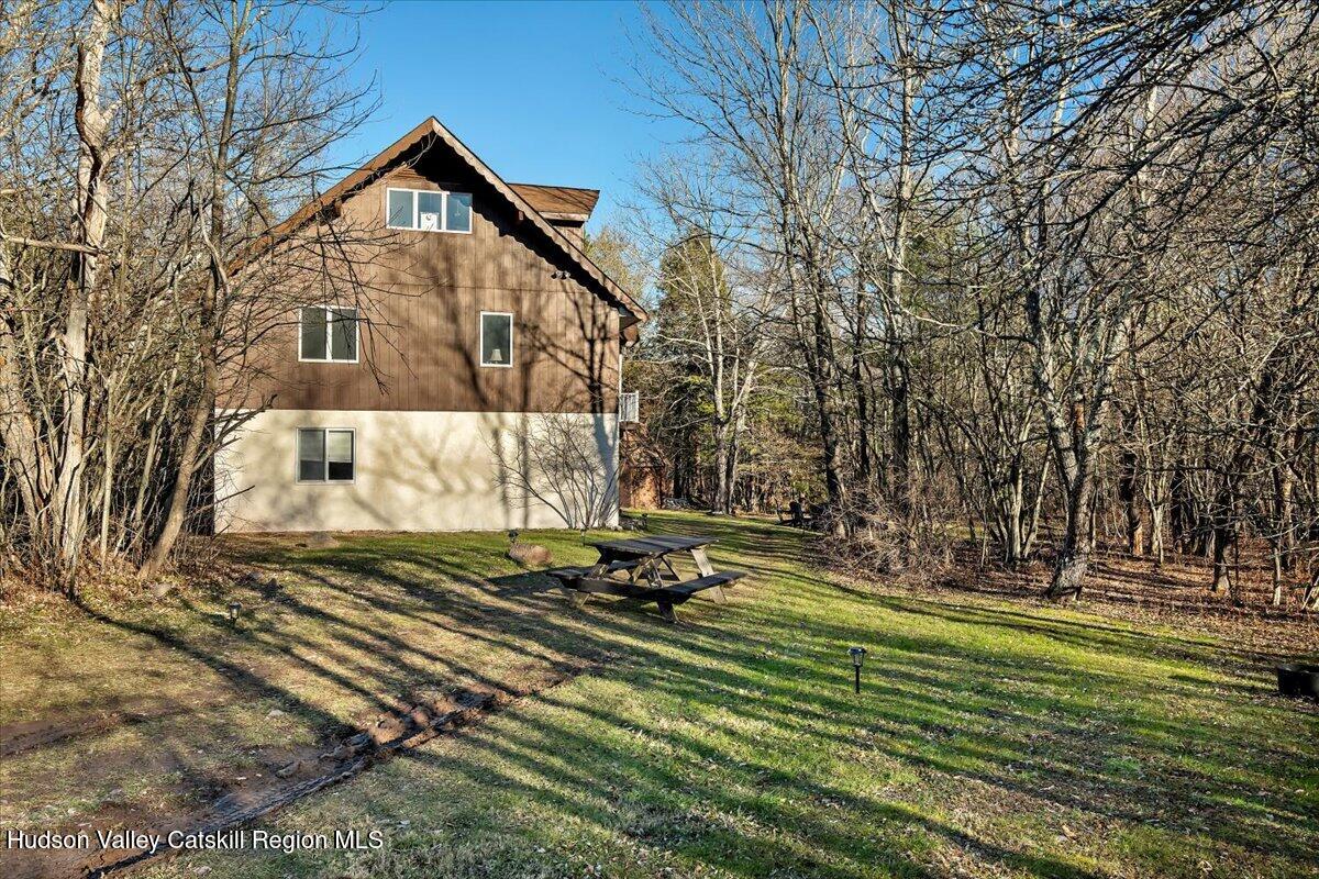 114 Ford Hill Road Hunter, NY 12442 - Photo 35 of 40 a front view of a house with a yard