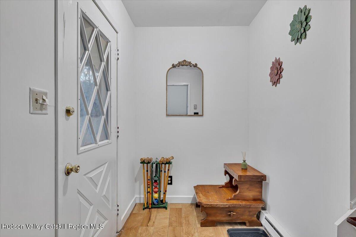 114 Ford Hill Road Hunter, NY 12442 - Photo 4 of 40 a room with furniture and wooden floor