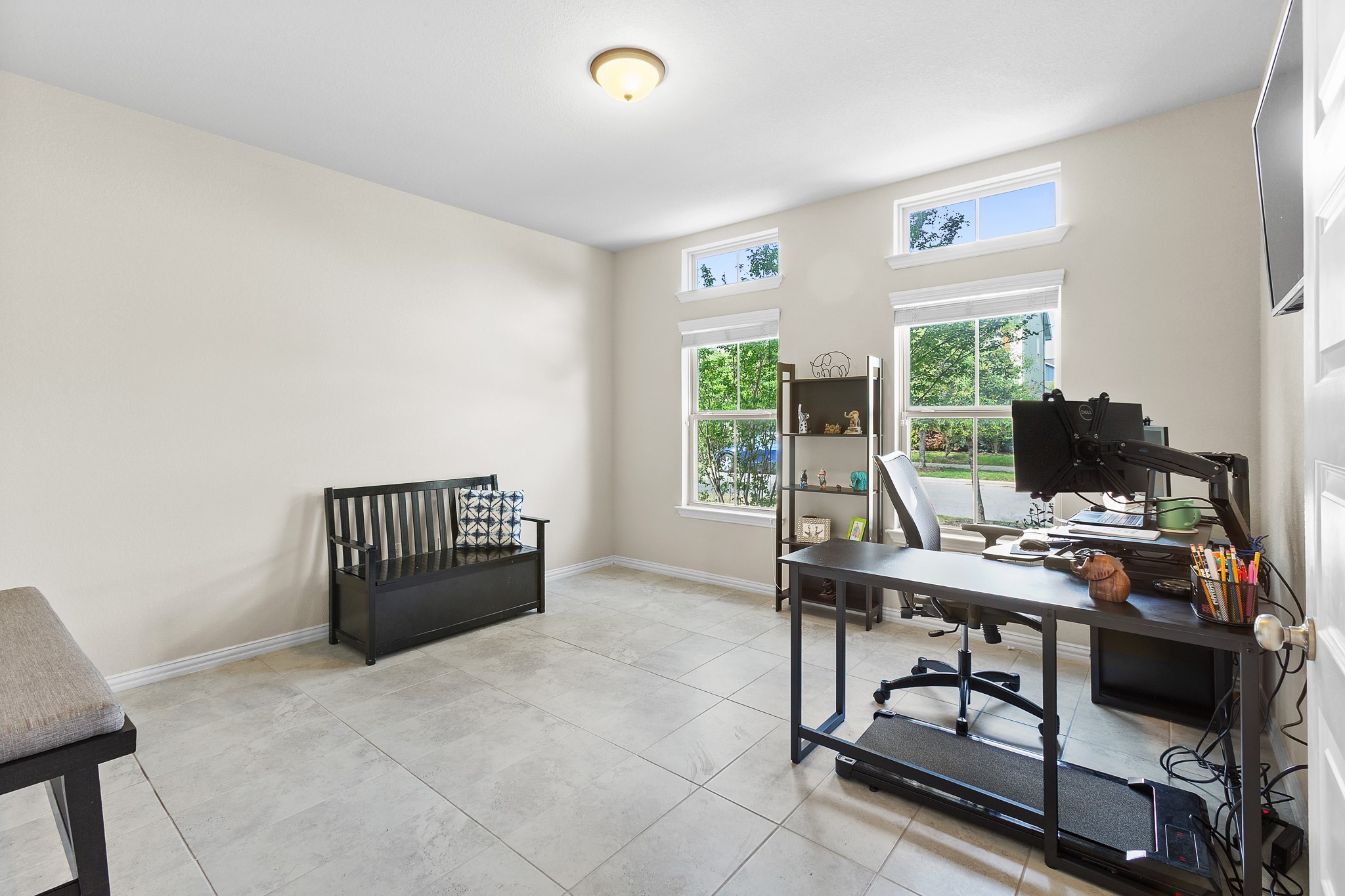 8709 Slater Drive Austin, TX 78747 - Photo 20 of 36 a workspace with furniture and a window