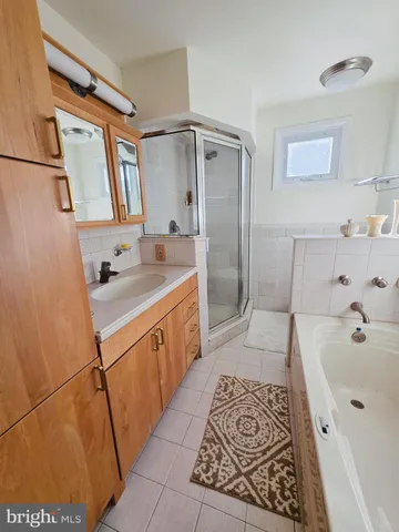 a room with furniture and a flat screen tv