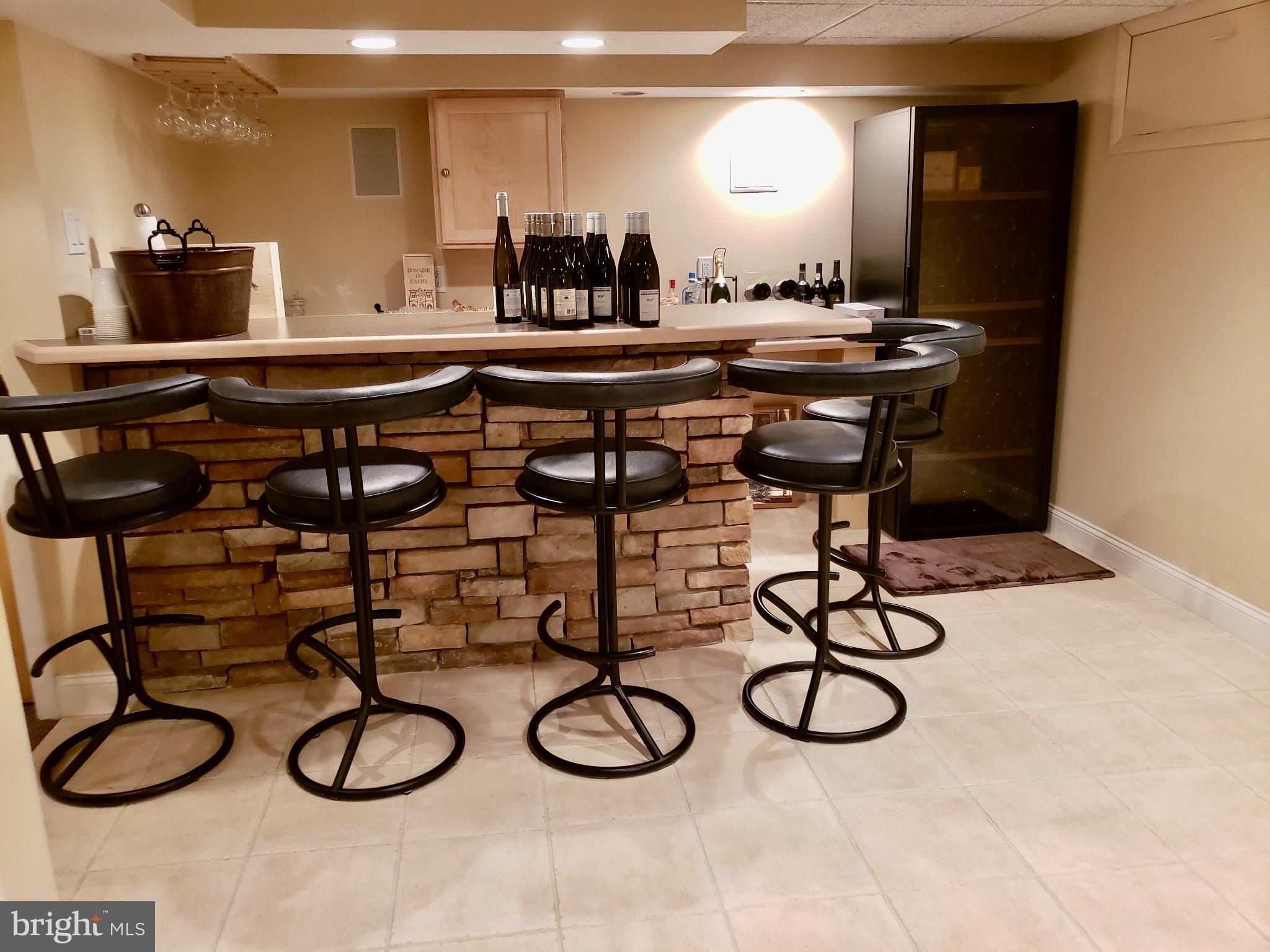 992 Sheffield Lane Huntingdon Valley, PA 19006 - Photo 28 of 31 a kitchen with a table and chairs in it