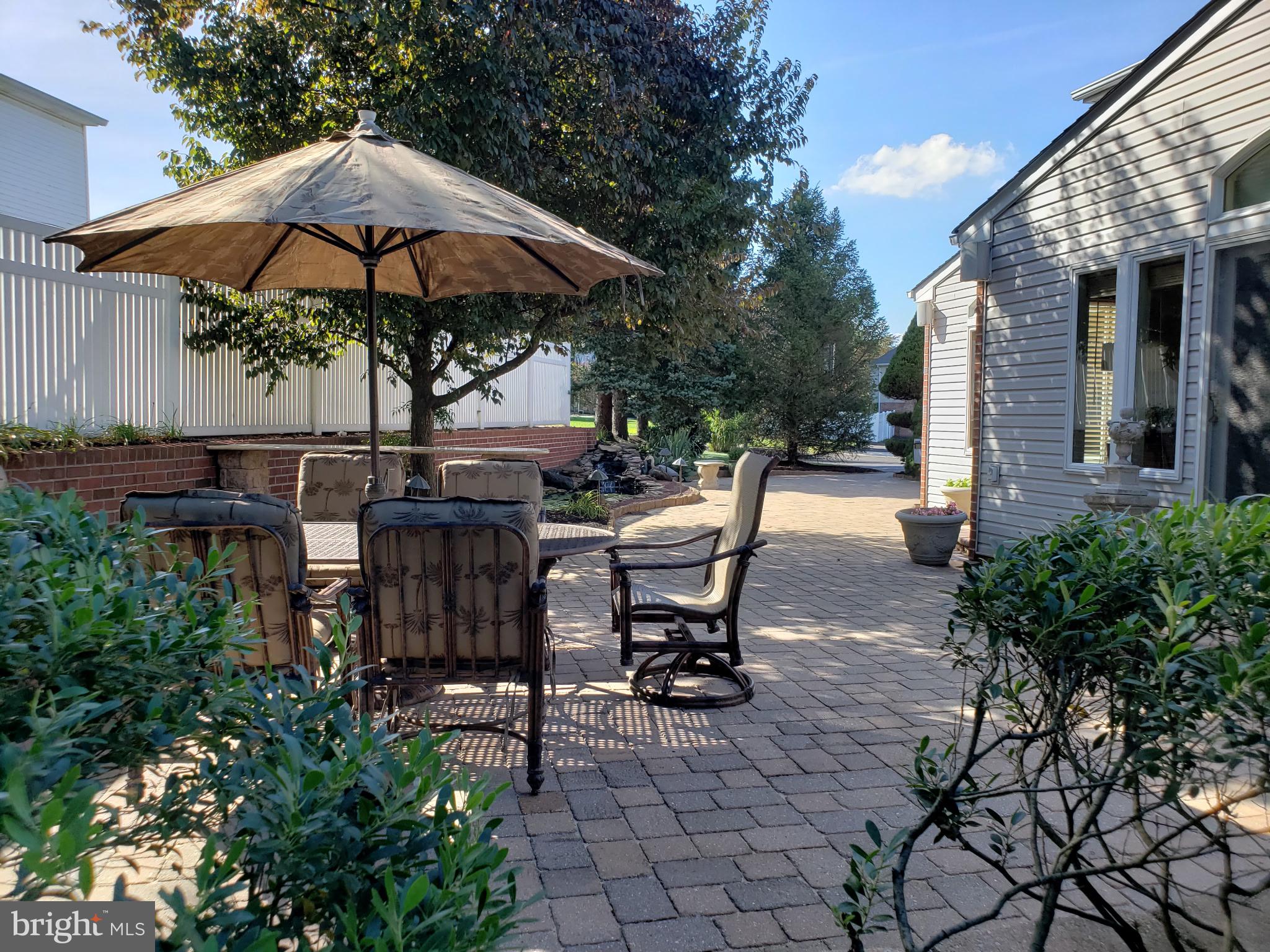 992 Sheffield Lane Huntingdon Valley, PA 19006 - Photo 3 of 31 a view of a backyard with sitting area and furniture