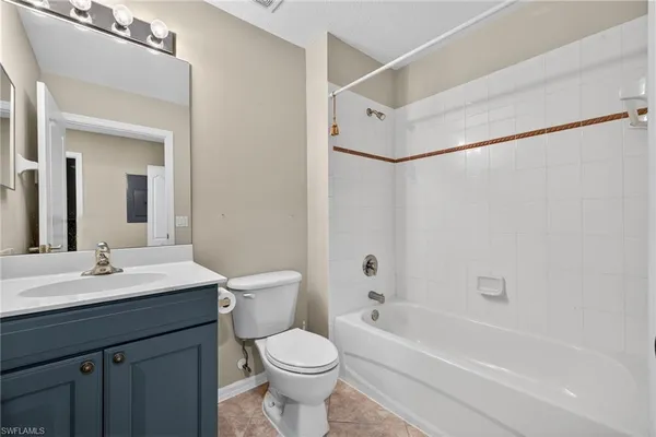 a bathroom with a sink a toilet and a bathtub