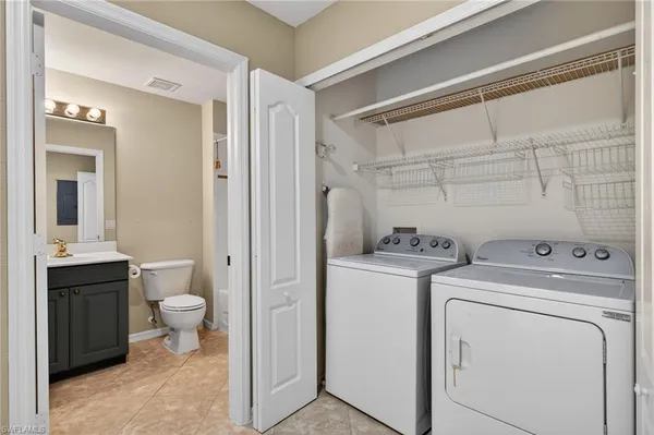 a view of bathroom with a sink and toilet
