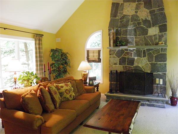 9 Ramsdell Street Marblehead, MA 01945 - Photo 8 of 27 a living room with furniture and a fireplace