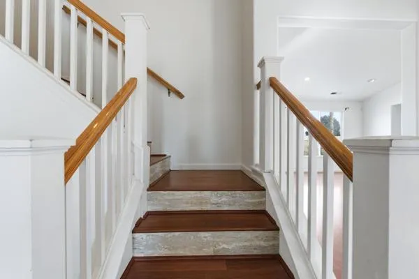 a bathroom with a sink double vanity and a mirror