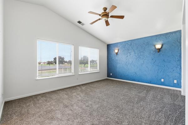 384 Millbrook Street Hanford, CA 93230 - Photo 42 of 59 a view of an empty room with a window