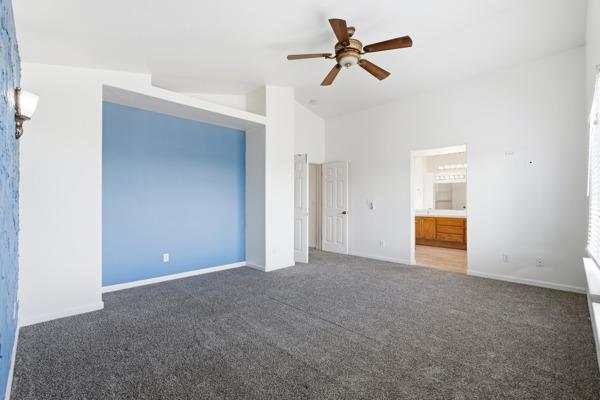 384 Millbrook Street Hanford, CA 93230 - Photo 43 of 59 a view of empty room with ceiling fan
