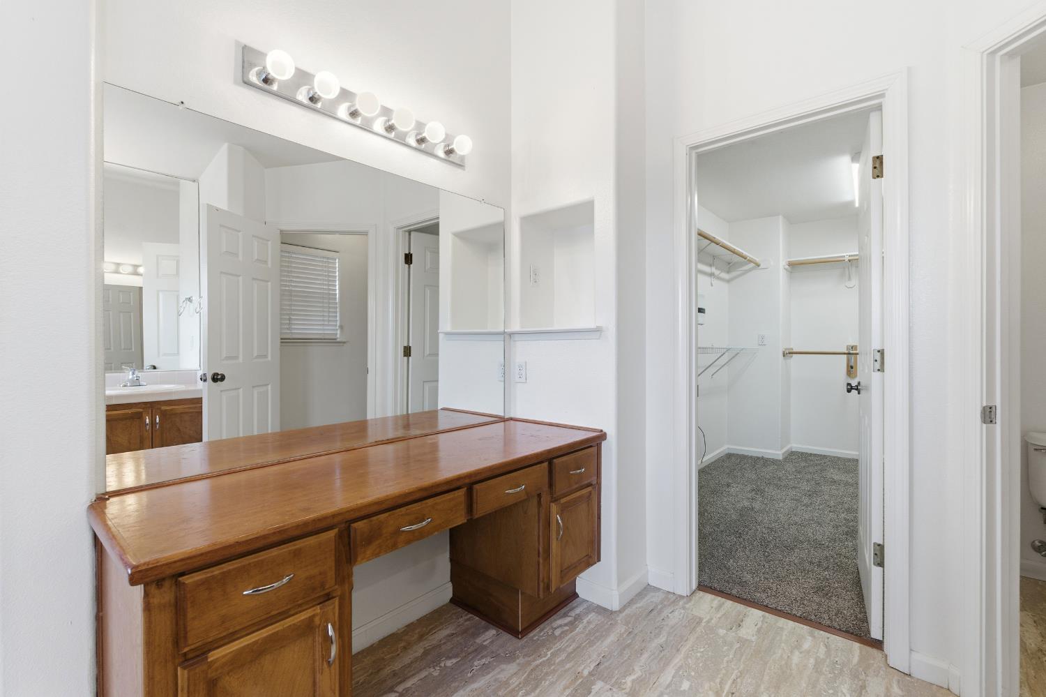 384 Millbrook Street Hanford, CA 93230 - Photo 45 of 59 a room with a table and chairs