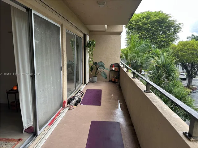 a backyard of a house with outdoor seating