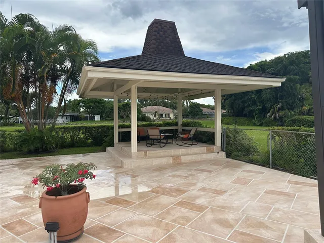 a view of a hallway with a livingroom and a living room