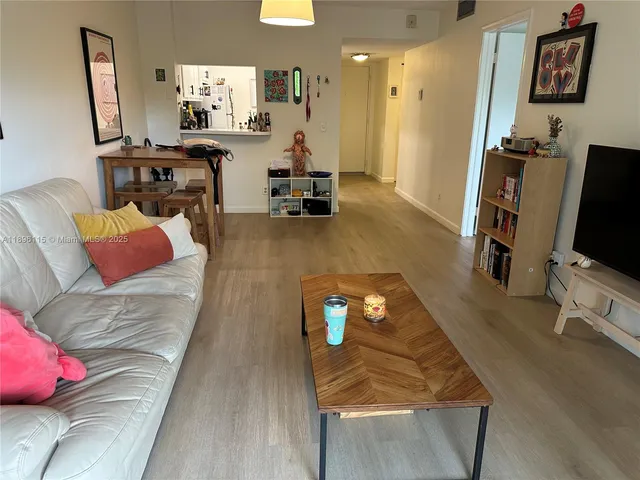 a living room with a couch and a table