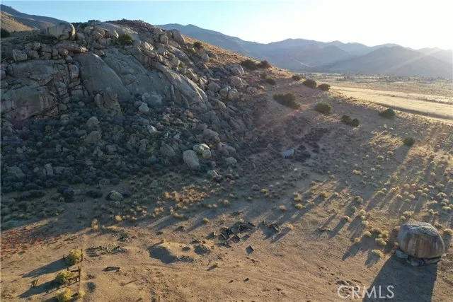 0 Buck Road Weldon, CA 93283 - Photo 14 of 23 a view of a dry field with mountains in the background