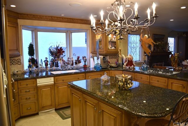 a bedroom with a bed and glass door