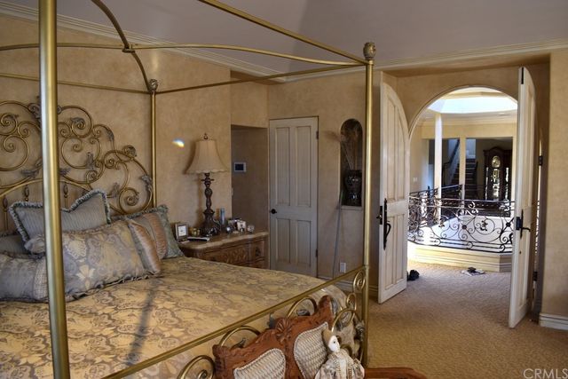 a view of a two chairs and a table in a patio