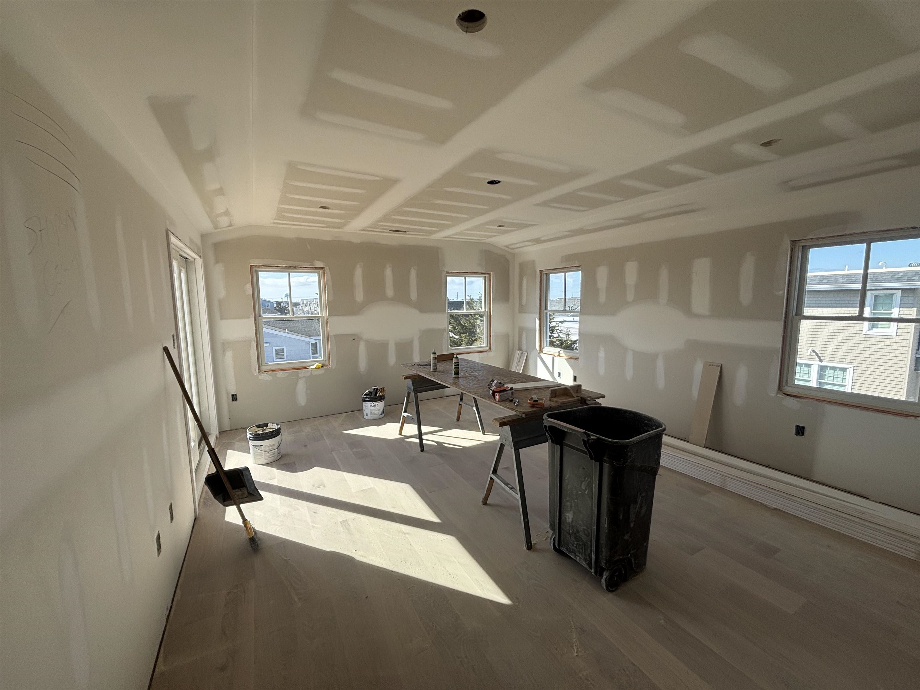 174 23rd Street Avalon, NJ 08202 - Photo 3 of 15 a view of a dining room with furniture a livingroom and chandelier