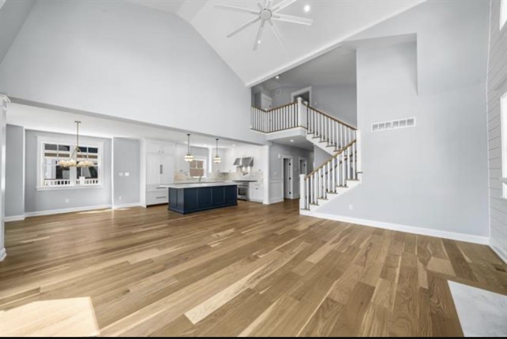 174 23rd Street Avalon, NJ 08202 - Photo 6 of 15 a view of empty room with wooden floor and fan