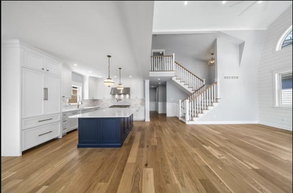 174 23rd Street Avalon, NJ 08202 - Photo 7 of 15 a view of kitchen and hall with wooden floor