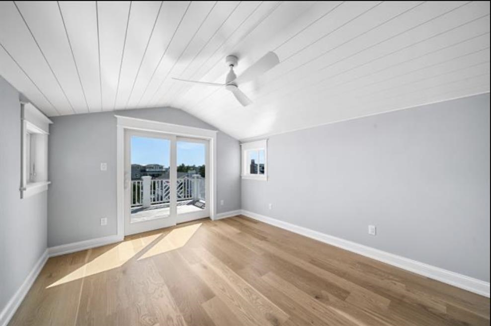 174 23rd Street Avalon, NJ 08202 - Photo 10 of 15 wooden floor in an empty room with a window