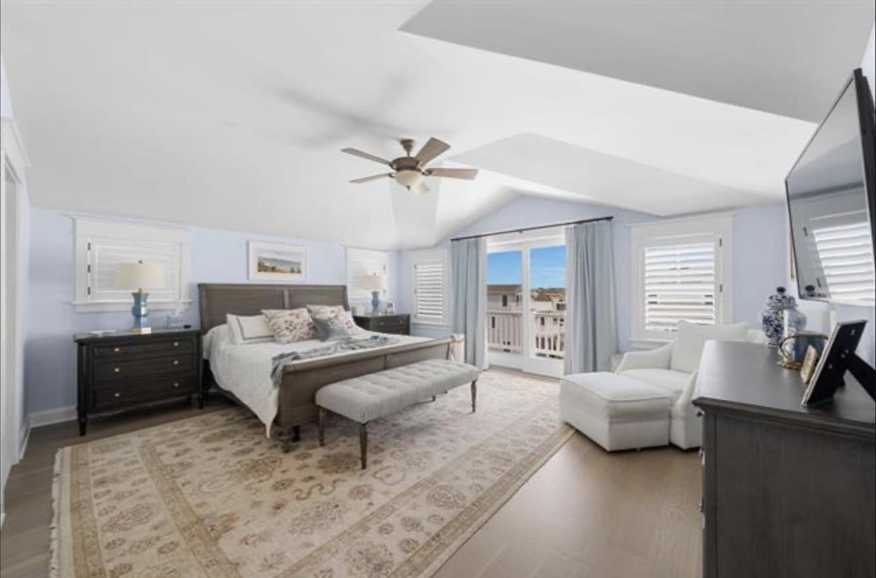 174 23rd Street Avalon, NJ 08202 - Photo 10 of 23 a bedroom with a bed and furniture