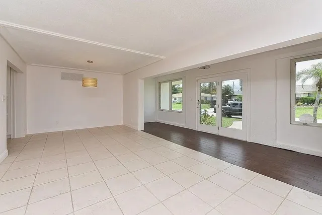 an empty room with windows