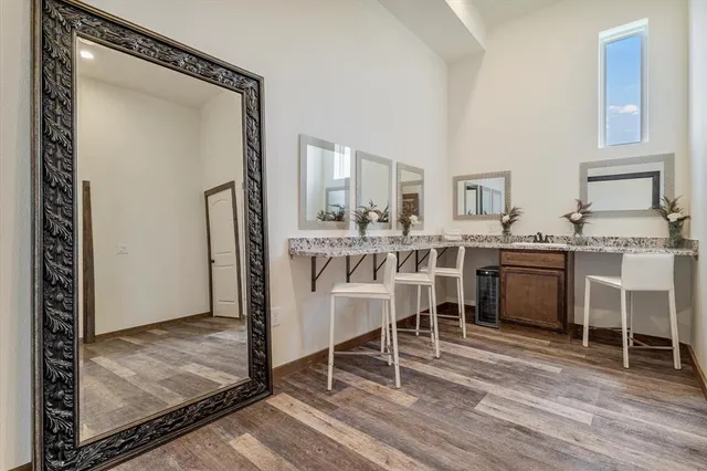 a dining room with a table and chairs