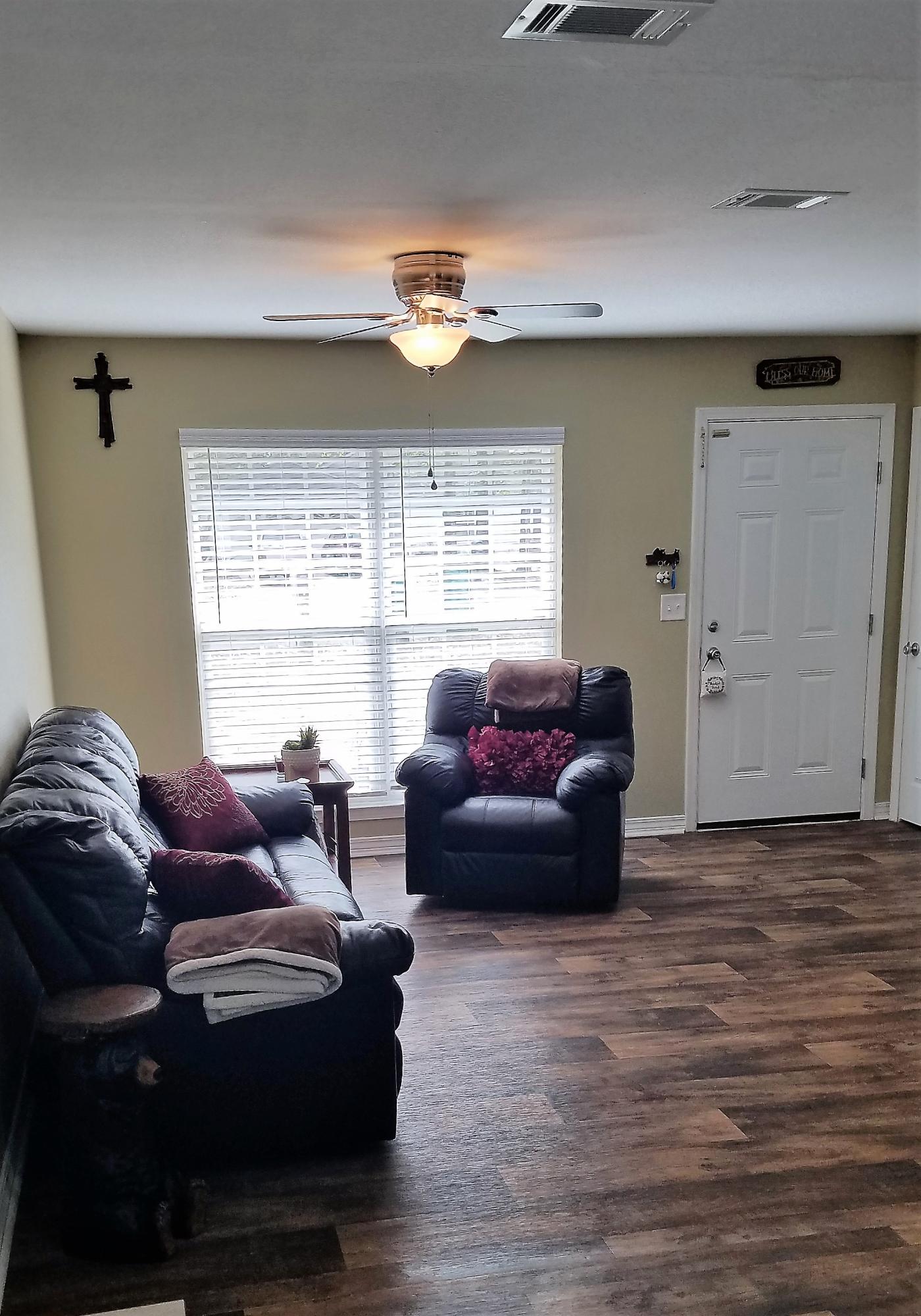 3111 Auburn Road Crestview, FL 32539 - Photo 2 of 16 a living room with furniture and a window