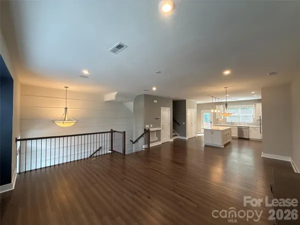 a bathroom with a shower and a sink