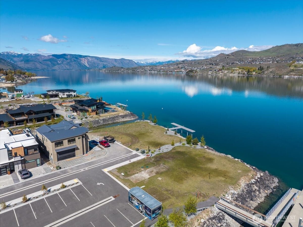 105 Bass Lane Chelan, WA 98816 - Photo 1 of 29 an aerial view of a house with a lake view