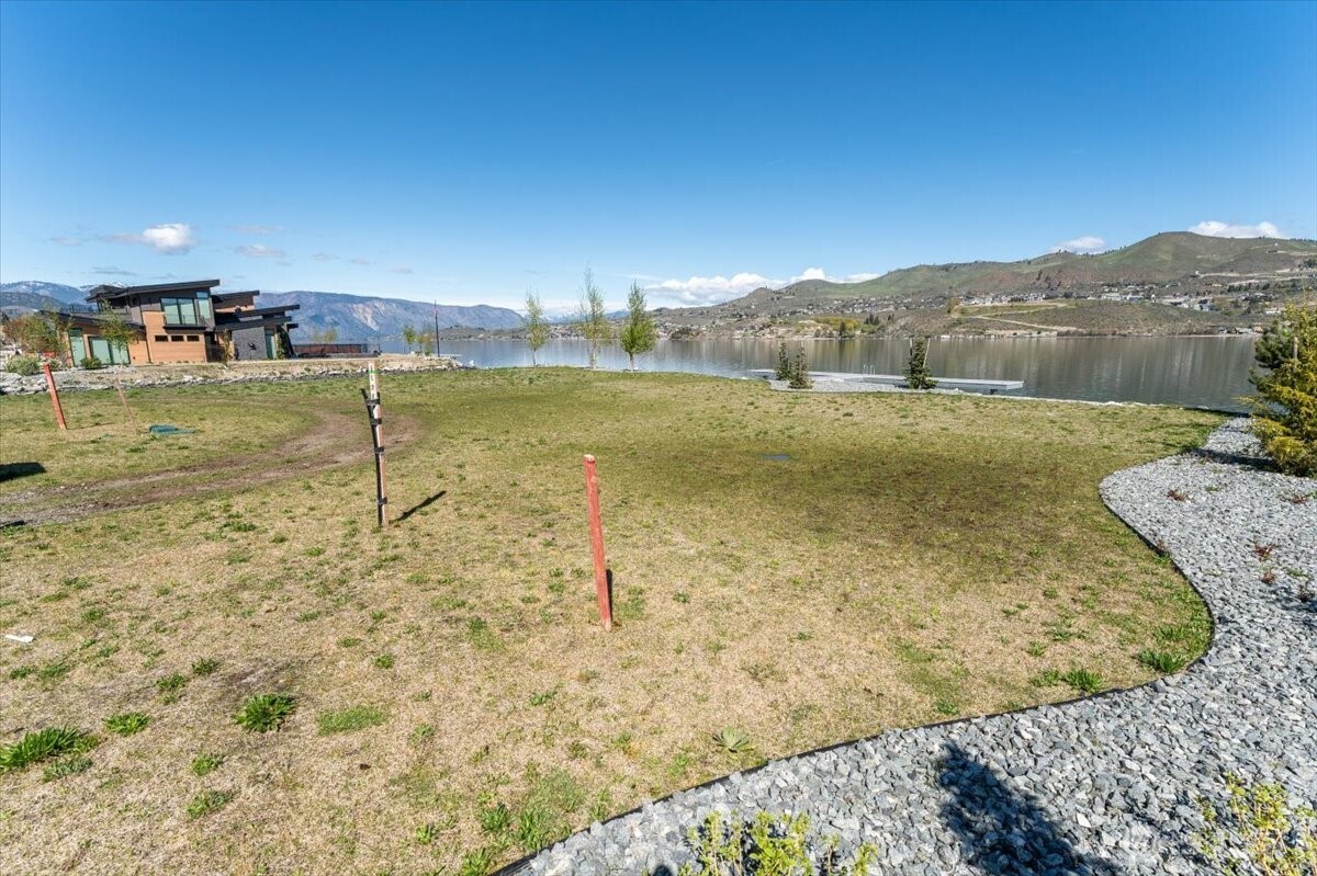 105 Bass Lane Chelan, WA 98816 - Photo 11 of 29 a view of a lake with a mountain in the background