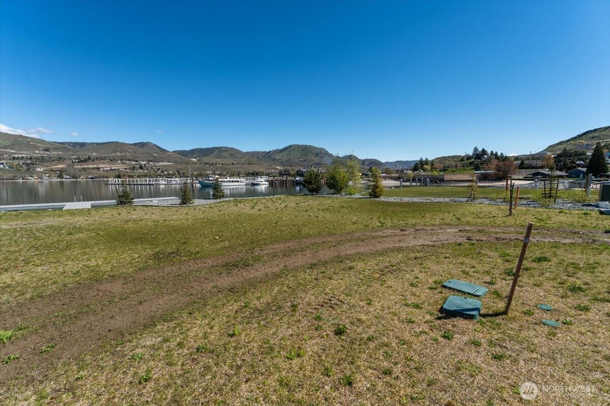 105 Bass Lane Chelan, WA 98816 - Photo 14 of 29 a view of a lake with a mountain