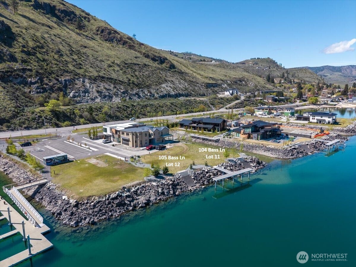105 Bass Lane Chelan, WA 98816 - Photo 22 of 29 a view of a swimming pool with a lake view