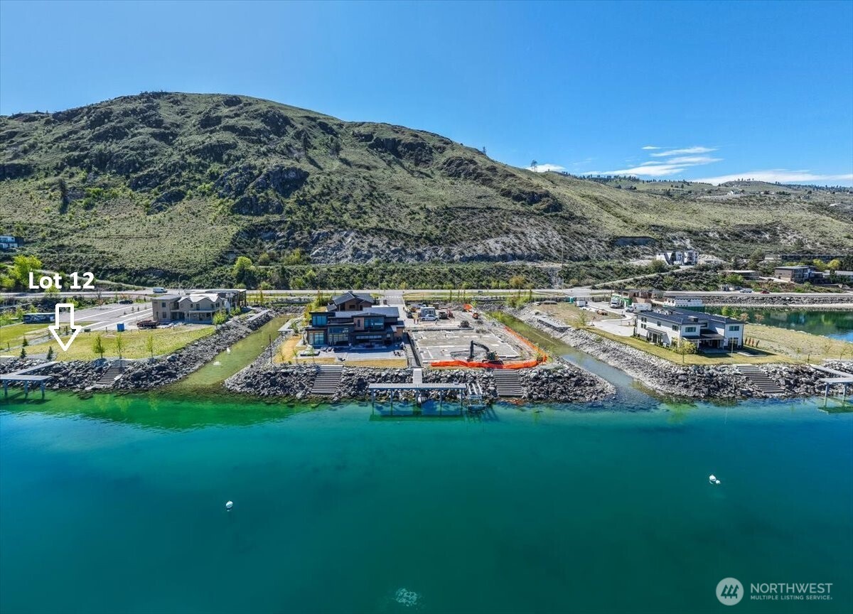 105 Bass Lane Chelan, WA 98816 - Photo 27 of 29 a view of a city with mountains in the background